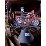 A modern painted reproduction cast iron porch bell with motorcycle pattern finial