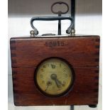 An early 20th Century polished oak cased Plasschaert pigeon racing clock bearing number 42915 and