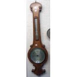 A 19th Century oak cased banjo barometer/thermometer with mercury works and silvered dial marked for