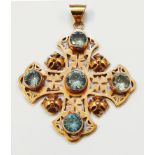 A 2" marked 14k rose metal ornate Gothic cross pattern pendant with five collar set round pale