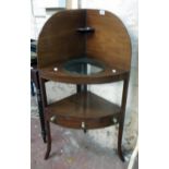 A 24" 19th Century mahogany corner washstand with small shelf and bowl aperture to the top, the