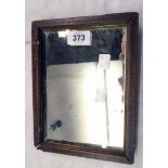 A late Georgian stained wood and strung framed small mirror with old plate