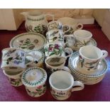 A quantity of Portmeirion Botanic Garden tea cups, saucers, jug, etc.