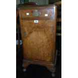 A 15" 20th Century figured walnut veneered bedside pot cupboard in the antique style with drawer and
