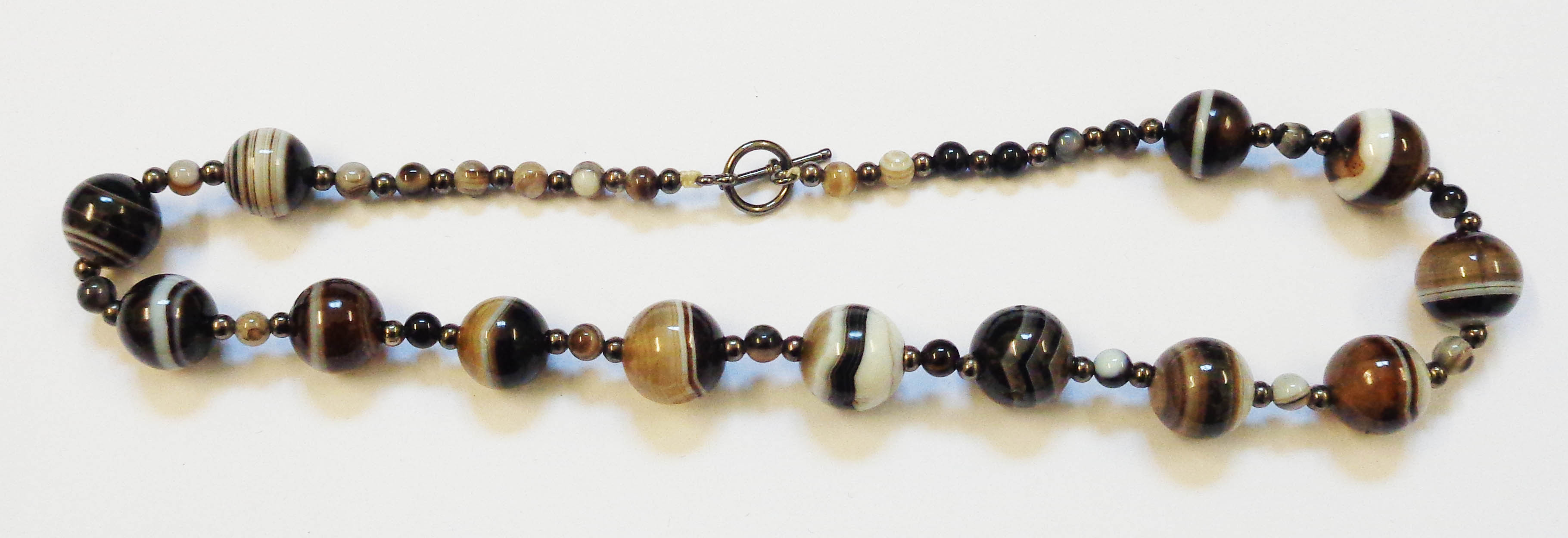 A banded agate bead choker necklace