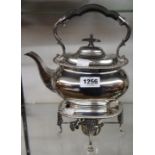 An early 20th Century Walker & Hall silver plated spirit kettle with gadrooned borders, stand and
