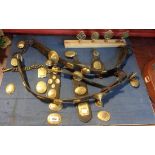 A collection of antique horse brasses, terrets and maker's name plates - Devon and Cornwall local