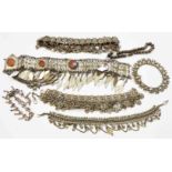A collection of Persian white metal bracelets and necklaces, some set with coloured and hardstones