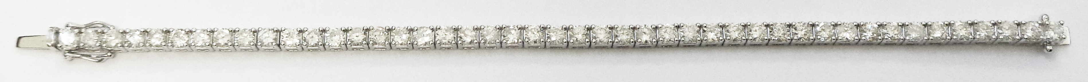 A marked 18k white metal bracelet, each of the links set with an individual brilliant cut - Image 3 of 3