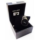 A Police gentleman's black finish quartz wristwatch - boxed with paperwork