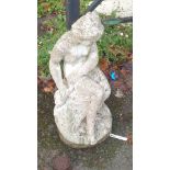 A garden statue of the bather