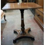 A 24" 19th Century mahogany pedestal table, set on turned pillar and quatrefoil base with bun feet