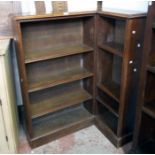 An early 20th Century polished oak corner bookcase with moulded top and open adjustable shelves -