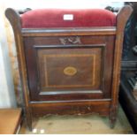 An Edwardian inlaid mixed wood locker piano stool with flanking turned handles and fall front