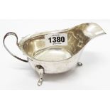 An Edward Viner silver gravy boat with shaped rim and pad feet - Sheffield 1963