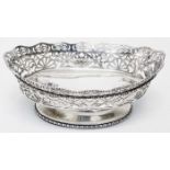 An 8 1/4" silver oval pedestal bowl with pierced decoration and beaded foot - Birmingham 1913