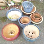 Eleven various garden pots