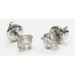 A pair of diamond solitaire stud ear-rings with marked 750 butterflies - 1.30ct. TDW