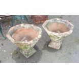 A pair of octagonal footed planters