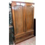 A 3' 11" Victorian mahogany double wardrobe with reduced cornice, material lined hanging space