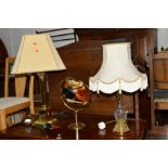 A BRASS COLUMN TABLE LAMP with shade, brassed circular dressing mirror and a modern glass table lamp