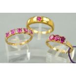 THREE 9CT GOLD PINK STONE GEM SET RINGS to include a single stone rub over set band, assessed as