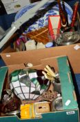 TWO BOXES OF SUNDRY ITEMS, to include Tiffany style lamp shade, musical instruments, novelty money