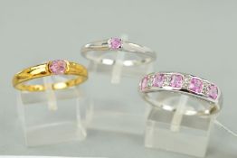 THREE 9CT GOLD PINK SAPPHIRE DRESS RINGS to include a pink and white sapphire half hoop, ring size