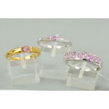 THREE 9CT GOLD PINK SAPPHIRE DRESS RINGS to include a pink and white sapphire half hoop, ring size