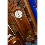 A 20TH CENTURY STAINED WOOD VIENNA WALL CLOCK, 30 hour movement, the circular dial with Roman