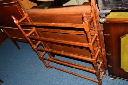 A STAINED PINE TOWEL RAIL