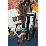 A QUANTITY OF VINTAGE GOLF EQUIPMENT to include a bag with clubs and a trolley