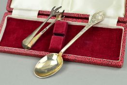 A ;PAIR OF SILVER SUGAR TONGS AND A CASED SILVER SPOON, the sugar tongs designed with talon shaped