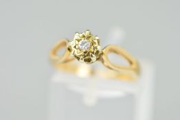 A 9CT GOLD DIAMOND RING, designed as a brilliant cut diamond within an illusion setting to the