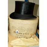 A GENTLEMANS TOP HAT IN A DUNN & CO BOX, approximate size 54cm/21inches, together with a pair of