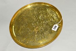 A BRASS NEWLYN STYLE CIRCULAR TRAY, unmarked, approximate diameter 28cm