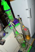 THREE DYSON UPRIGHT VACUUM CLEANERS