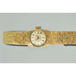 A MID TO LATE 20TH CENTURY 9CT GOLD LADY'S SHIELD WRISTWATCH, mechanical hand wound movement, case