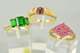 THREE GOLD GEM SET RINGS to include a 9ct gold circular stone garnet ring, ring size U, a 9ct gold