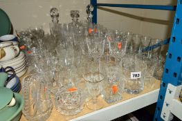 A QUANTITY OF CUT AND PRESSED GLASS, to include decanters, cocktail stirrers and drinking glasses