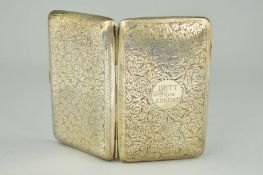 A LATE VICTORIAN SILVER CIGARETTE CASE of rectangular outline with engraved scrolling acanthus