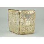 A LATE VICTORIAN SILVER CIGARETTE CASE of rectangular outline with engraved scrolling acanthus