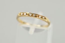 A CUBIC ZIRCONIA HALF ETERNITY RING, designed as six circular cubic zirconias, stamped 585, ring