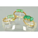 THREE 9CT GOLD EMERALD DRESS RINGS to include a three stone oval mixed cut emerald, ring size O, a