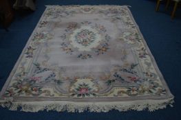 A 20TH CENTURY CHINESE WOOLLEN CARPET SQUARE, cream ground with foliate design, 284cm X 185cm