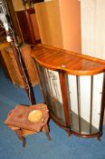 AN ART DECO WALNUT SINGLE DOOR CHINA CABINET, a carved oak occasional table, an oak tray, standard