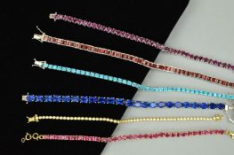 SIX GEM LINE BRACELETS to include a composite glass filled ruby claw set bracelet, a square shape