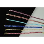 SIX GEM LINE BRACELETS to include a composite glass filled ruby claw set bracelet, a square shape