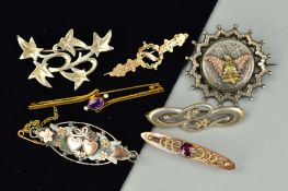 A COLLECTION OF EARLY 20TH CENTURY BROOCHES to include two gem set bar brooches, one amethyst and