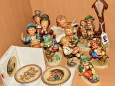 A GROUP OF HUMMEL FIGURES AND PLATES, to include 'Wayside Devotion' HUM28, 'Singing Lesson'